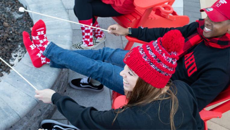 Students roasting marshmellows